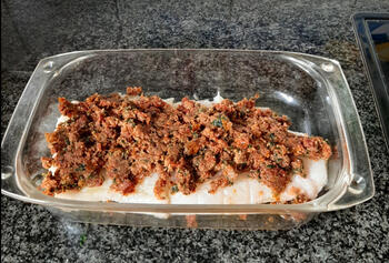 Kabeljauwfilet in de oven met zongedroogde tomatenkorst 4